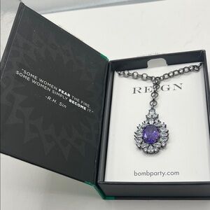 Reign main stone dark violet cubic zirconia w hematite plating. 18” Necklace